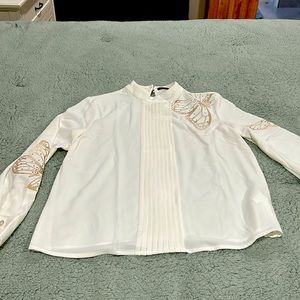 NWOT blouse with butterfly embroidery. Size XS